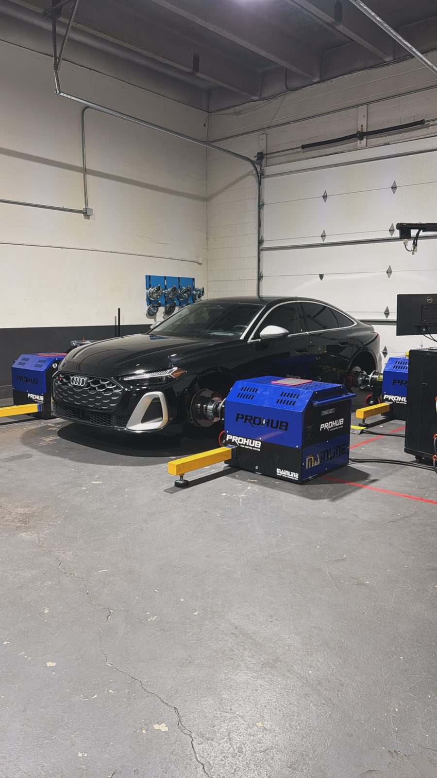 Black Audi B10 S5 on the Mainline ProHub hub dyno in the PME shop